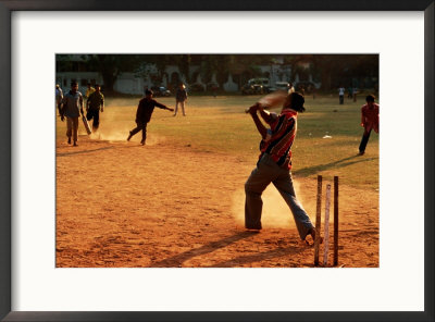 Cricket Batsman Swings On Dusty Pitch, Fort Cochin, India by Anthony Plummer Pricing Limited Edition Print image