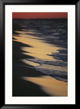 Surf Gently Lapping On A Sandy Beach At Twilight by Raymond Gehman Pricing Limited Edition Print image