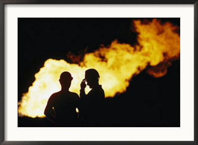 Natural Gas Workers Silhouetted By Burning Dross by George F. Mobley Pricing Limited Edition Print image