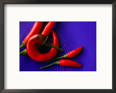 Red Chilli Peppers On A Blue, Patterned Plate, Australia by John Hay Pricing Limited Edition Print image