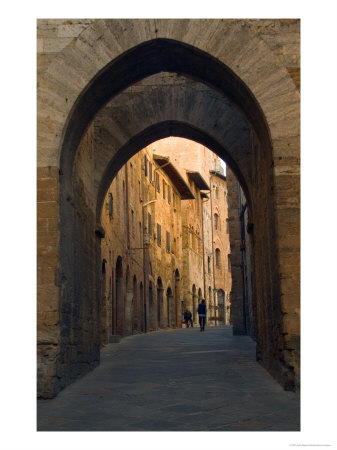Walking Down The Medieval Streets, San Gimignano, Tuscany, Italy by Janis Miglavs Pricing Limited Edition Print image
