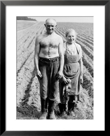 Elderly Polish Farming Couple Posing In The Fields Near Bialystok by Paul Schutzer Pricing Limited Edition Print image