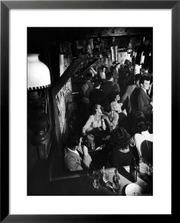 Inside A Crowded Pub With Couple Kissing, St. Germain Des Pres by Gjon Mili Pricing Limited Edition Print image