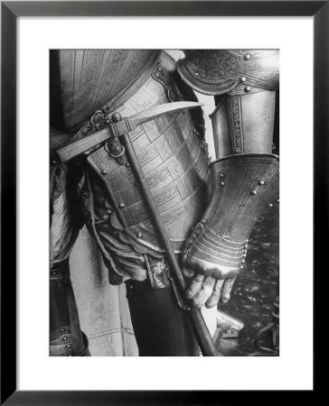 Armor Piercing Hammer Hanging From Belt Of A Spanish Suit Of Armor by Fritz Goro Pricing Limited Edition Print image