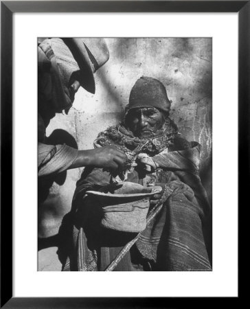 Beggar Being Given Coca Leaves by Eliot Elisofon Pricing Limited Edition Print image