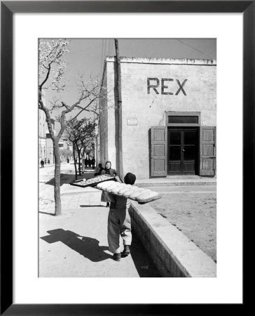 Baker's Apprentice Carrying A Large Tray Of Bread Dough by Alfred Eisenstaedt Pricing Limited Edition Print image