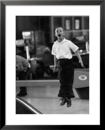 Child Bowling At A Local Bowling Alley by Art Rickerby Pricing Limited Edition Print image
