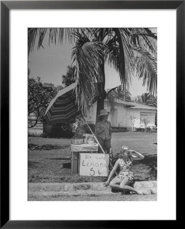 Young Girls Selling Lemonade From A Sidewalk Stand by Nina Leen Pricing Limited Edition Print image