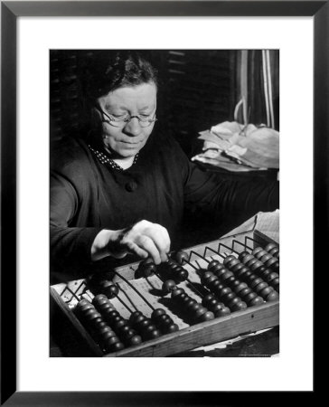 Russian Woman Using An Abacus To Calculate Numbers In Business by Margaret Bourke-White Pricing Limited Edition Print image