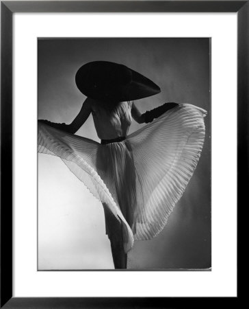 Model Dorian Leigh Sporting Black Picture Hat And A Straight Hanging Sheer Dress by Gjon Mili Pricing Limited Edition Print image