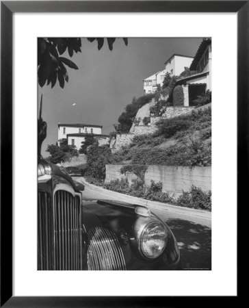 Closeup Of The Front Of An Unidentified Car Parked Along The Street by Andreas Feininger Pricing Limited Edition Print image