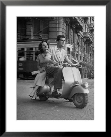 Man And Woman Riding A Vespa Scooter by Dmitri Kessel Pricing Limited Edition Print image