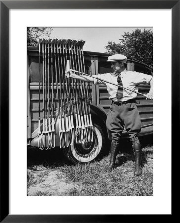 Polo Player Checking The Mallets by Alfred Eisenstaedt Pricing Limited Edition Print image