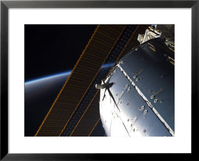 Portion Of The International Space Station's Columbus Laboratory And Solar Array Panels by Stocktrek Images Pricing Limited Edition Print image