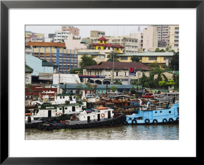 Barges On River Pasig With City Buildings Behind, Manila, Philippines, Southeast Asia by Kober Christian Pricing Limited Edition Print image
