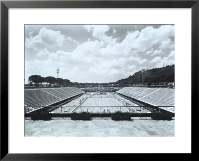 Sporting Facility With Two Swimming Pools, One Of Which Is Olympic Size, With Swimmers by A. Villani Pricing Limited Edition Print image