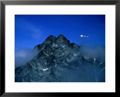 Helicopter Flying Over Mt. Venjetind, Near Romsdalen, Romsdalen Alps, Norway by Anders Blomqvist Pricing Limited Edition Print image