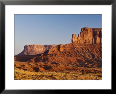 Sentinel Mesa Rock Formation In Monument Valley, Seen At Sunrise by Witold Skrypczak Pricing Limited Edition Print image
