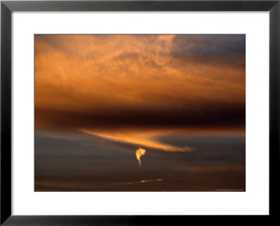 Strange Comma-Like Cloud Formation At Sunset by Raymond Gehman Pricing Limited Edition Print image