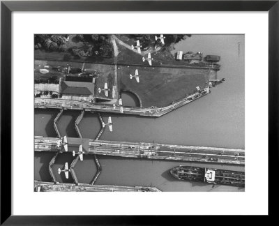 Aerial View Of Planes Flying Over The Panama Canal by Thomas D. Mcavoy Pricing Limited Edition Print image