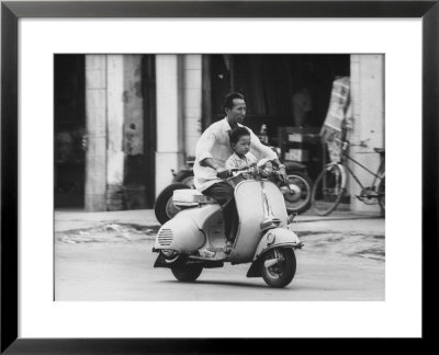 Man With His Son On Scooter by John Dominis Pricing Limited Edition Print image