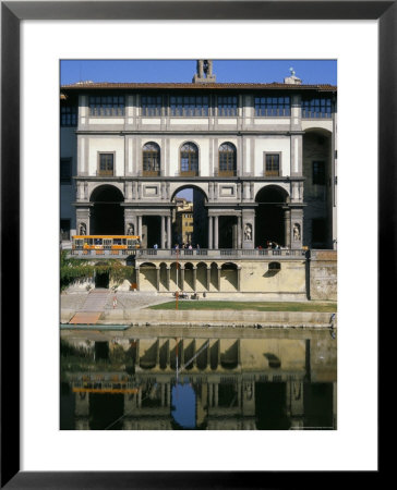 The Uffizi Reflected In The Arno River, Florence, Tuscany, Italy by Nedra Westwater Pricing Limited Edition Print image