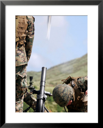 Marines Employing The Direct-Lay Method Of Firing Mortars by Stocktrek Images Pricing Limited Edition Print image