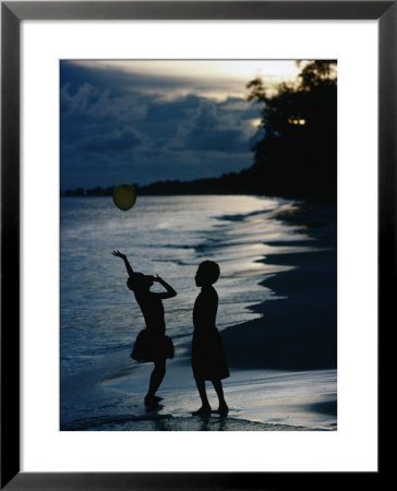 Young Girls Playing With A Balloon On Kiriwina Island, Kiriwina Island, Milne Bay, Papua New Guinea by Michael Gebicki Pricing Limited Edition Print image