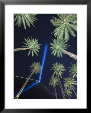 A Pointed Source Of Light Sits Atop Las Vegas's Luxor Hotel by Jim Richardson Pricing Limited Edition Print image