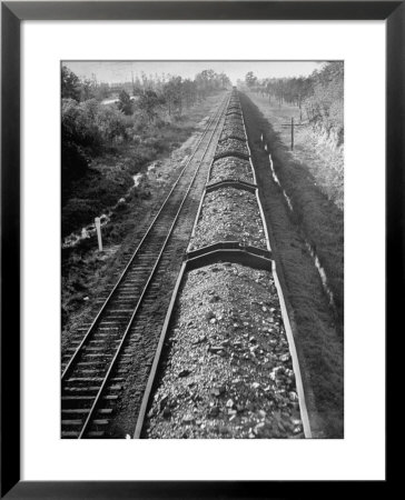 Wartime Railroading: Coal Cars Of Freight Train Of The Charleston And Western Carolina Line by Alfred Eisenstaedt Pricing Limited Edition Print image