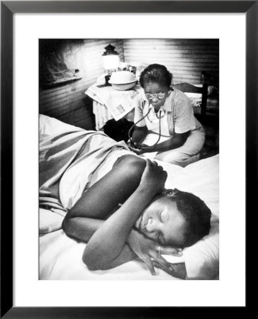 Famous Midwife-Nurse Maude Callen, Attending A Woman In Labor by W. Eugene Smith Pricing Limited Edition Print image