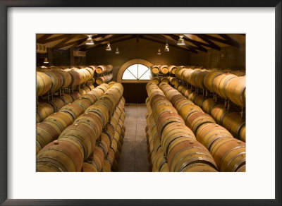 Oak Barrels In Wine Cellar At Groth Winery In Napa Valley, California, Usa by Julie Eggers Pricing Limited Edition Print image