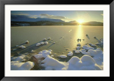 Loch Morlich At Sunset In Winter, Snow-Covered Rocks, Loch Cairngorms National Park, Scotland by Mark Hamblin Pricing Limited Edition Print image
