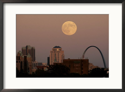 A Full Moon Rises Behind Downtown Saint Louis Buildings And The Gateway Arch Friday, October 6, 200 by Charlie Riedel Pricing Limited Edition Print image