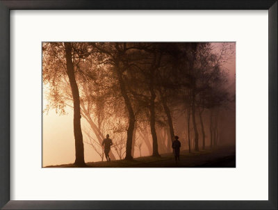 Runners In Fog At Sunrise, Seattle, Wa by Jim Corwin Pricing Limited Edition Print image