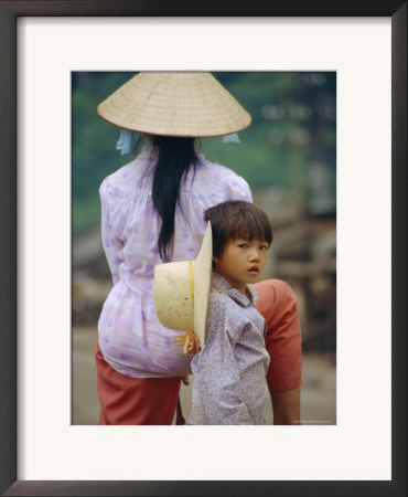 Portrait Of A Child And Mother Wearing Big Hats, Vietnam by Jane Sweeney Pricing Limited Edition Print image