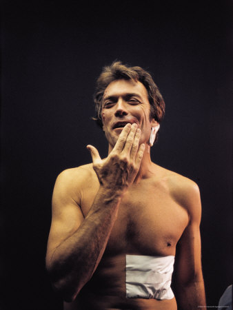 Actor Clint Eastwood Bare Chested Bandaged After A Brutal Beating Scene From Movie Dirty Harry by Bill Eppridge Pricing Limited Edition Print image