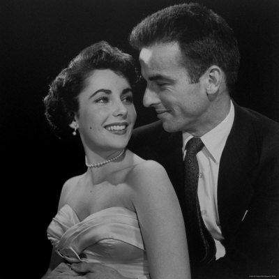 Elizabeth Taylor In Strapless Gown And Montgomery Clift In Suit, Gazing ...