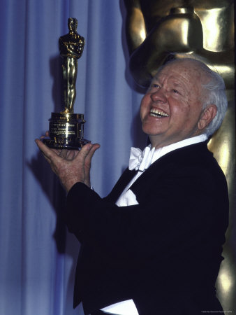 Mickey Rooney Holding Up His Oscar In Press Room At Academy Awards by John Paschal Pricing Limited Edition Print image