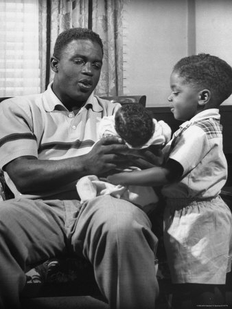 Jackie Robinson With 3 Year Old Son Jackie Jr. And Daughter Sharon In Mother-In-Law's Home by J. R. Eyerman Pricing Limited Edition Print image