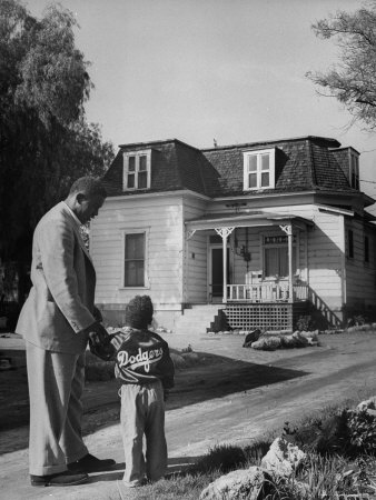 Jackie Robinson Showing Son His Home On Pepper St. During Filming Of The Jackie Robinson Story by J. R. Eyerman Pricing Limited Edition Print image