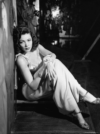 Gene Tierney In Sexy Gown As She Sits On Set Of Shanghai Gesture by Peter Stackpole Pricing Limited Edition Print image
