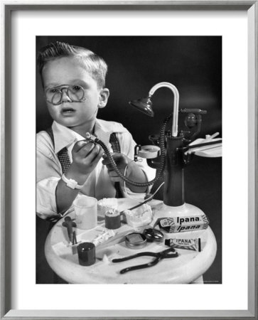 Little Boy With A Toy Dentist Set by Walter Sanders Pricing Limited Edition Print image