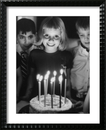 Little Girl Blowing Out Her Candles On Her Birthday Cake by Robert W. Kelley Pricing Limited Edition Print image