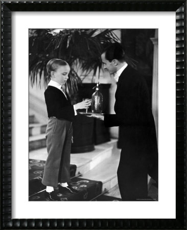 Little English Boy Gets Soda Water From Waiter, St. Moritz, 1931 by Alfred Eisenstaedt Pricing Limited Edition Print image