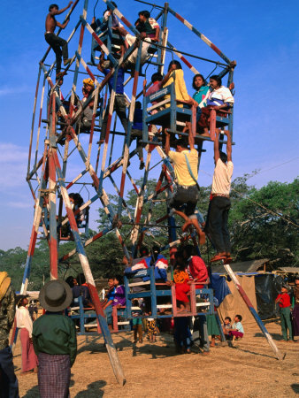 Man Operated Ferris Wheel At Pindaya Festival, Pindaya, Shan State, Myanmar (Burma) by Bernard Napthine Pricing Limited Edition Print image