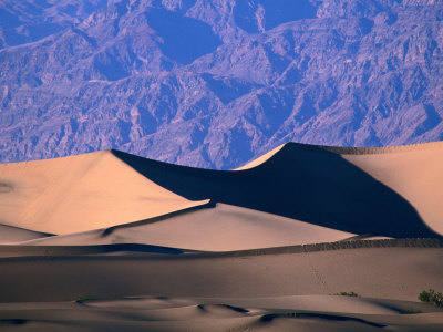Sand Dunes With Mountain Slope Behind, Death Valley National Park, Usa by Mark & Audrey Gibson Pricing Limited Edition Print image