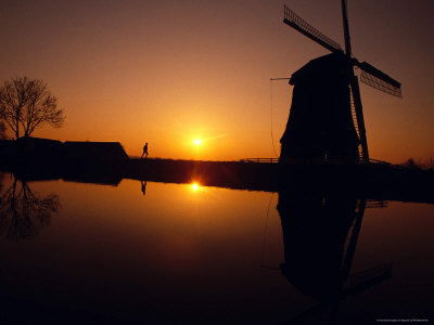 Silhouette Of A Windmill At Sunset by Fogstock Llc Pricing Limited Edition Print image