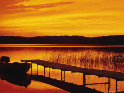 Sunrise On Pier And Boat by Ken Wardius Pricing Limited Edition Print image