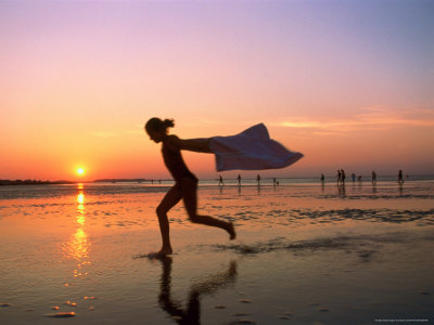 Silhouette Of Girl Running On Beach At Sunset, Ma by Kindra Clineff Pricing Limited Edition Print image